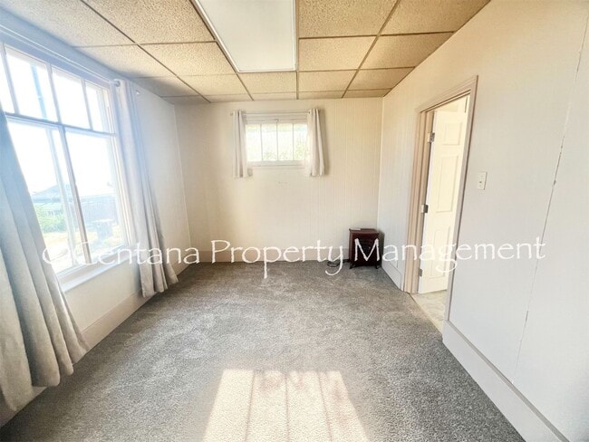 Building Photo - Quaint 2-bedroom cottage located in uptown...