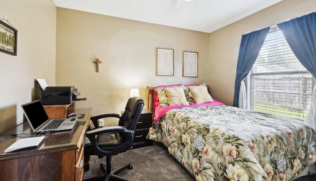 Building Photo - private - backyard fenced in large master suite!