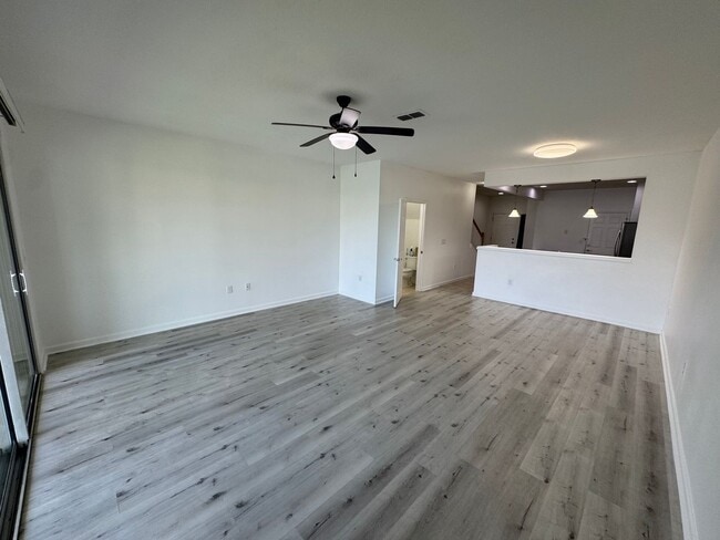 Building Photo - Lake Views. Upgraded Finishes. Gated Commu...