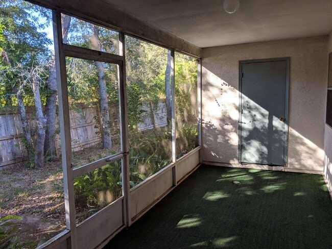 Building Photo - 2/2 Flat with Assigned Parking, Screen Porch, Inside Laundry