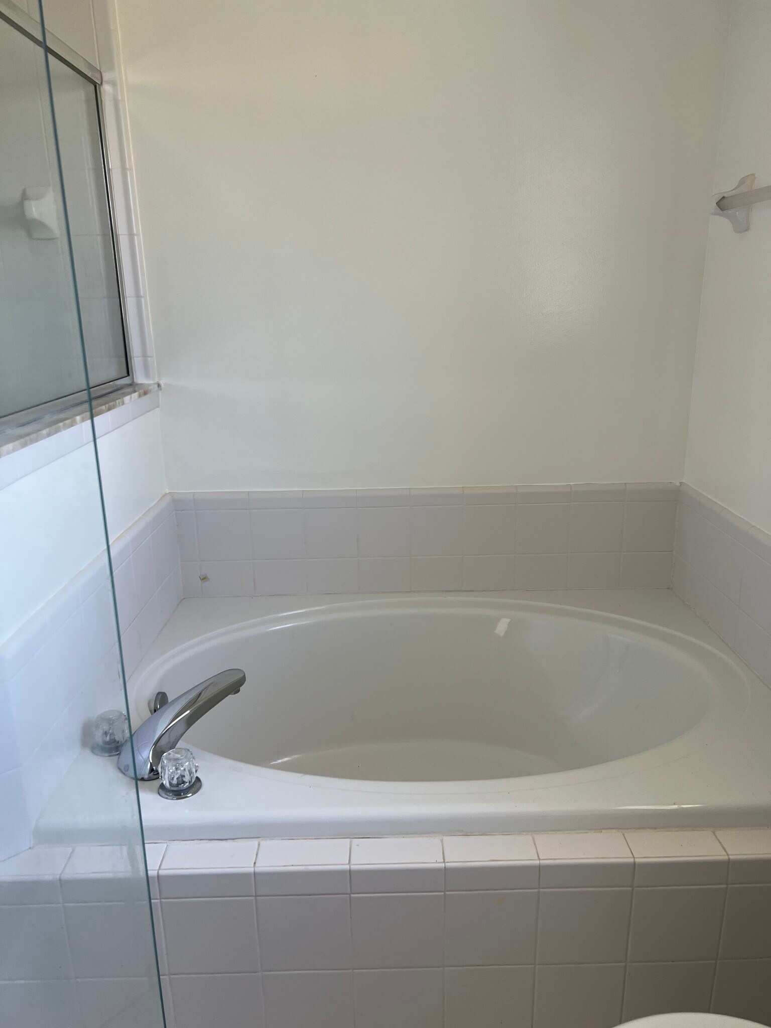 The master bath features a relaxing garden tub and dual sinks — perfect for a couple. - 5374 Lacy Jane Way