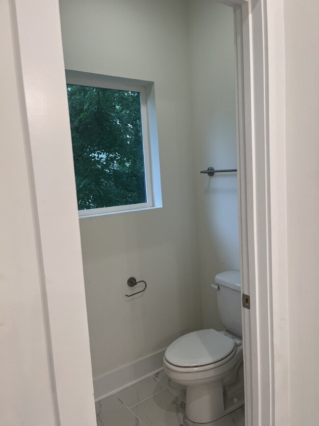 Building Photo - "Charming 4-Bedroom Nashville Oasis with E...