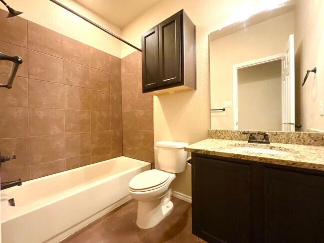 Building Photo - High Ceilings, Fenced Yard & 2-Car Garage – New Braunfels Living!