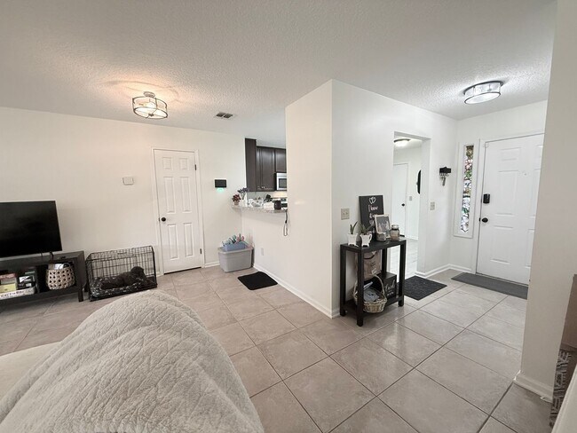 Building Photo - Peaceful Townhome in Fort Caroline with Fu...