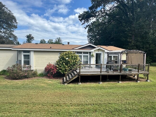 Primary Photo - Spacious 3-Bedroom Home with Fenced Lot an...