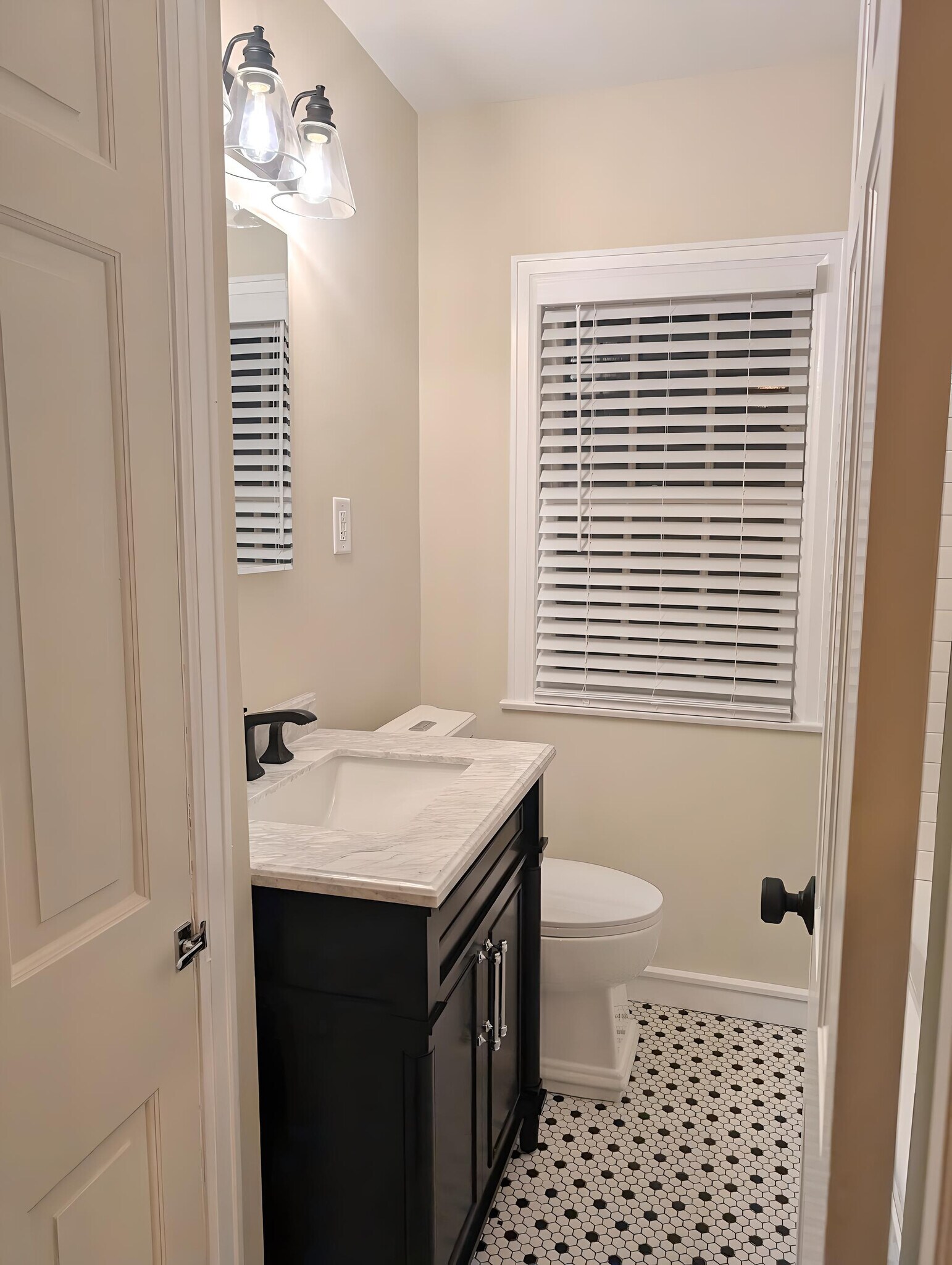 Renovated bathroom with new vanity and toilet - 2734 N Avondale Blvd