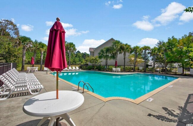 Building Photo - BRAND NEW FLOORING & FRESH PAINT - 3 Bedroom/2.5 Bath Townhome with garage in Wild Wing!