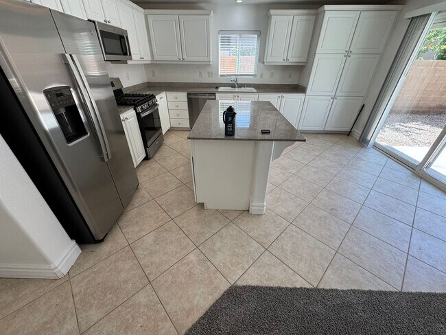 Building Photo - STUNNING 2 STORY HOME IN A GUARD GATED COM...