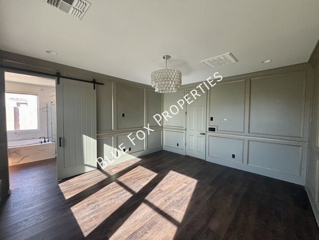 Building Photo - 8454 N Lone Ranger Rd