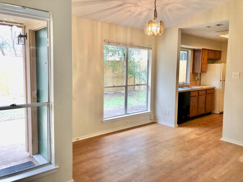 Unit A dining area and kitchen - 4504 Dorsett Oaks Cir
