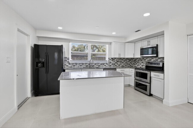 Building Photo - Renovated 3BR/2BA Corner Single-Family Home – Large Fenced Yard, NO HOA