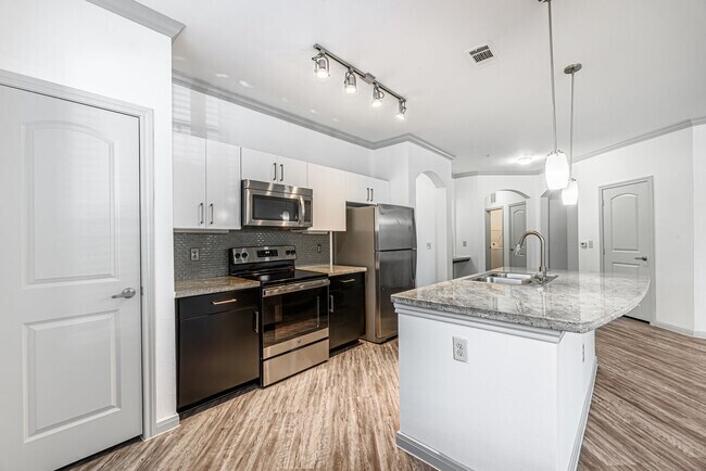 Building Photo - Save Big! Up to 8 Weeks Free & No Fees!