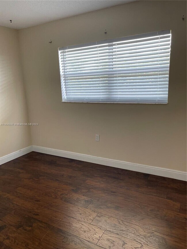 Building Photo - 8285 Sunrise Lakes Blvd