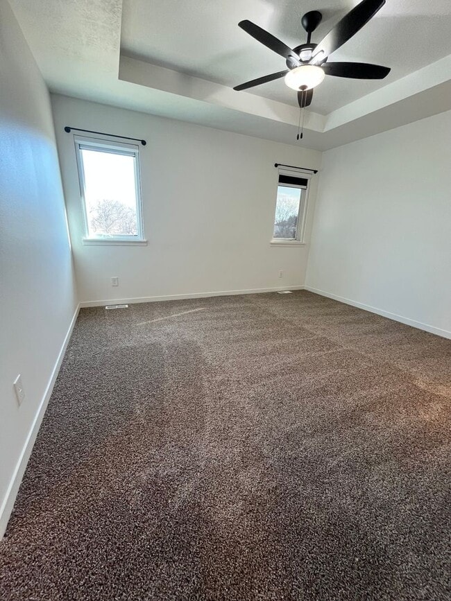 Building Photo - 4 Bed/3.5 Bath with 4 Stall Heated Garage!