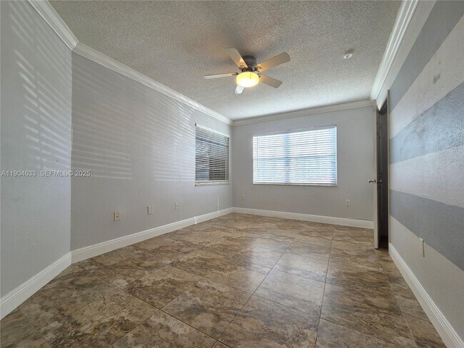 Building Photo - 10785 SW 108th Ave