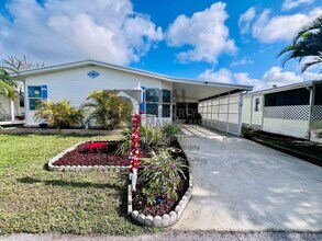 Building Photo - 202 Fan Palm Ln