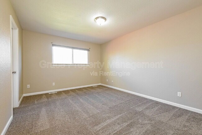 Building Photo - 1557 S Salida Way