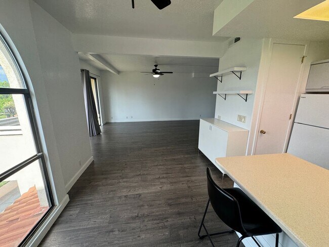 Building Photo - Recently updated condo with gym, pool, and...