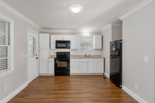 Building Photo - Beautifully updated, all-brick home locate...