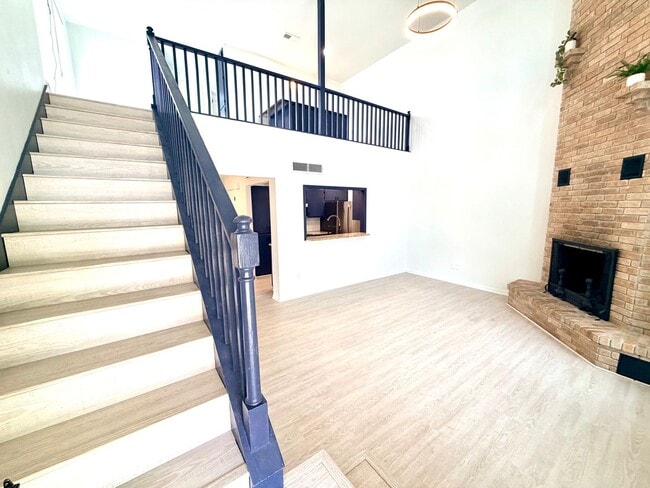 Building Photo - Stylish Two-Story Duplex with Loft, Fireplace & Private Backyard in New Braunfels!