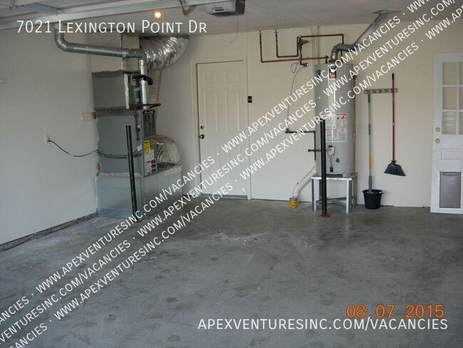 Building Photo - 7021 Lexington Point Dr