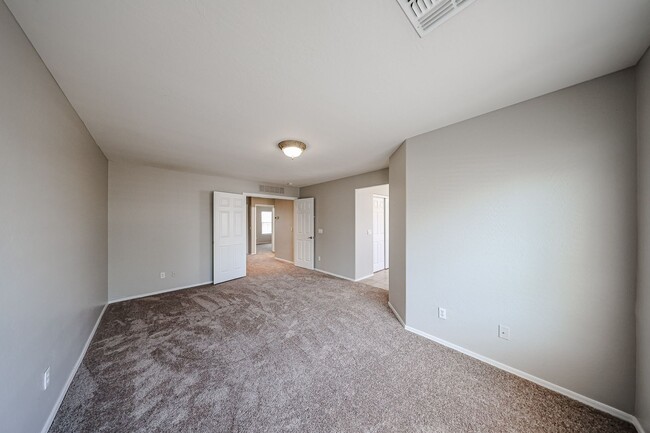 Building Photo - Welcome to this spacious 4 bedroom, 2.5 ba...