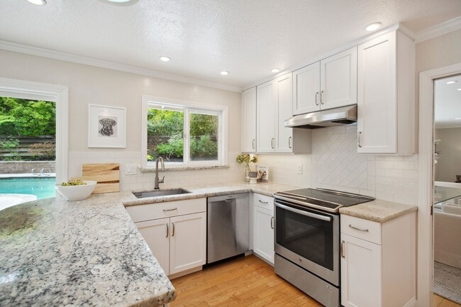 Building Photo - Updated 3 bedroom + office & pool, single ...