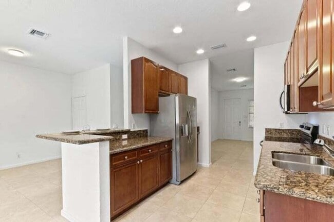 Building Photo - 6120 SE Portofino Cir