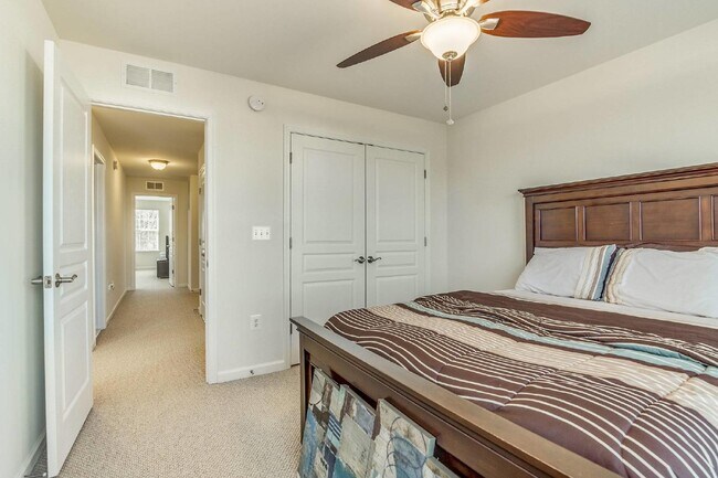 Building Photo - 3-bedroom, 2.5-bathroom condo with a great open-concept main level.