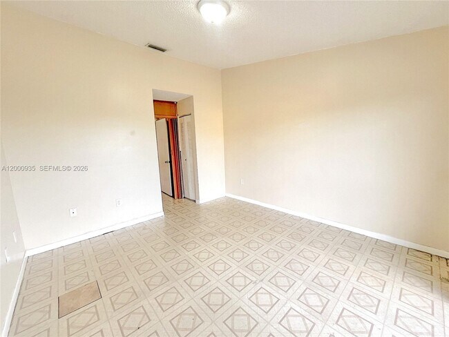 Building Photo - 5575 W 26th Ct