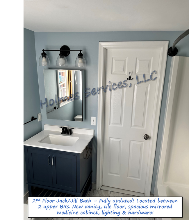 Upper bath - Jack & Jill style (between the 2 bedrooms). Fully updated in 2023. - 619 S Gainsborough Ave