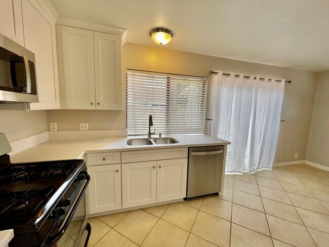 Building Photo - Discover the Essence of Irvine Living!