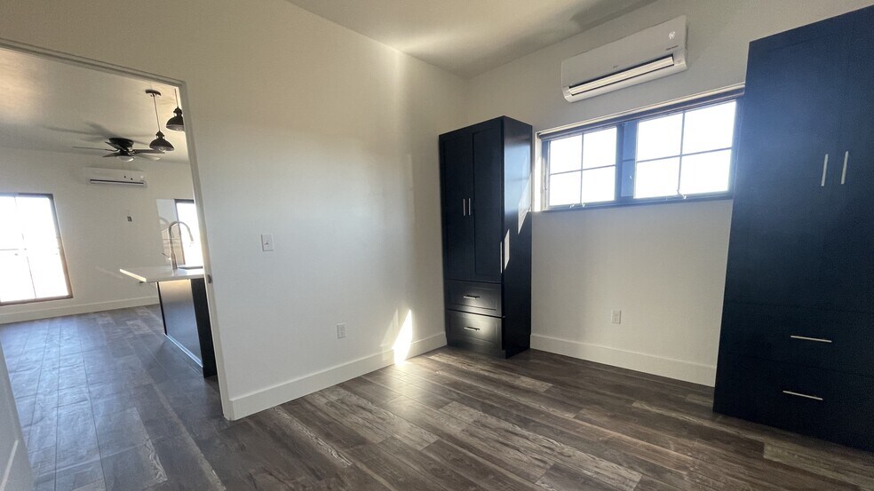 Bed with custom armoires - 100 Second St