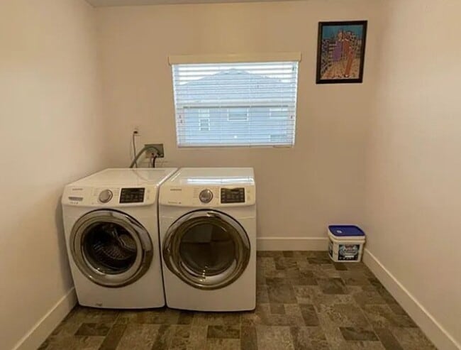 Building Photo - Spacious 4-Bedroom Home with Finished Basement in Taylorsville