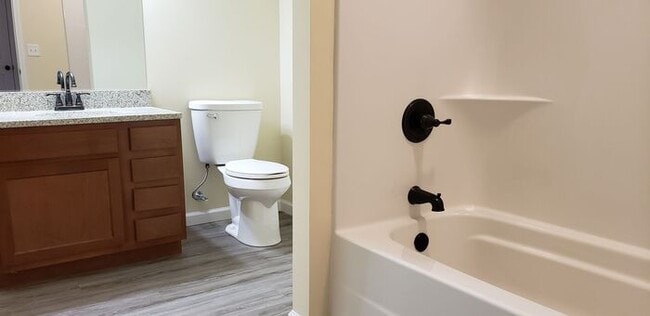 Building Photo - Settle in and cozy up in this comfortable lower-level two-bedroom apartment.