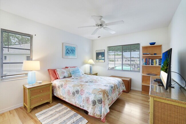 Building Photo - Furnished 2BR + Den Condo in Sapphire Lakes – Lake View, Amenities, 60-Day Minimum Stay