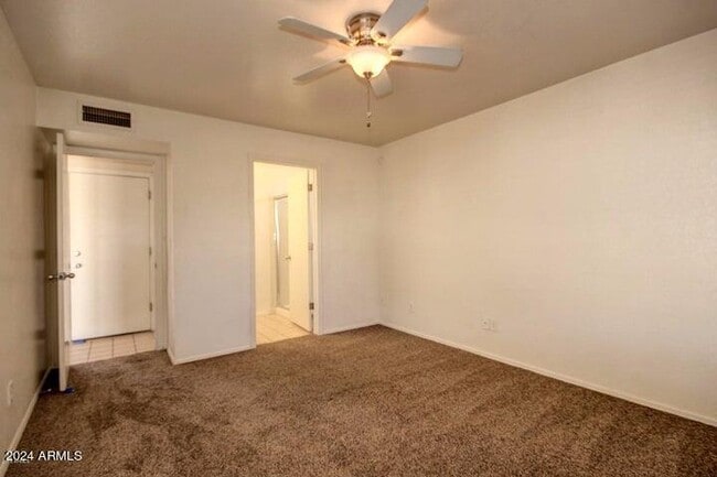 Building Photo - 1208 E Wickieup Ln