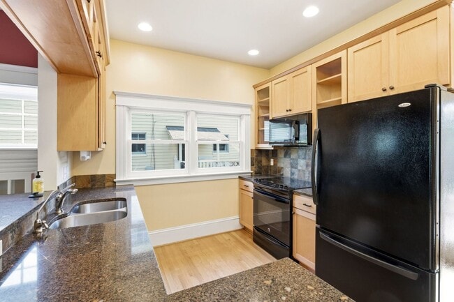 Building Photo - Timeless Grant Park Craftsman with Modern Comforts