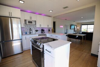 Building Photo - Fully Furnished Luxury Waterfront Unit w/i...