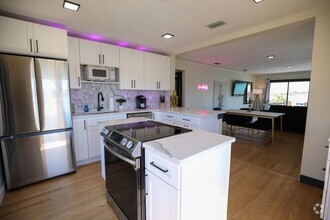 Building Photo - Fully Furnished Luxury Waterfront Unit w/i...