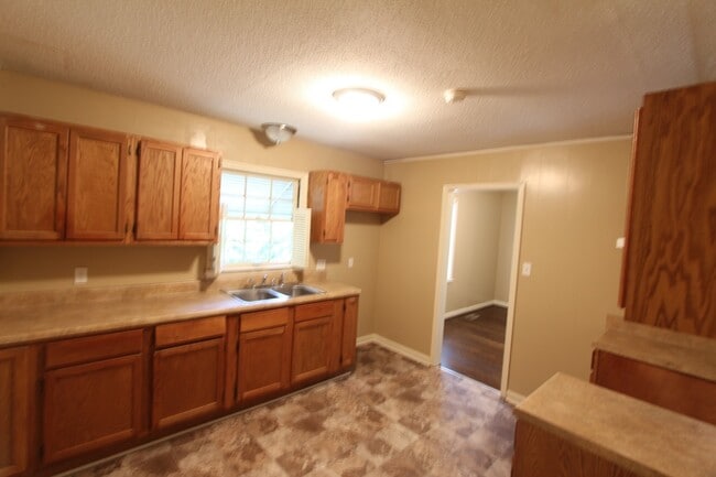 Building Photo - New On The Market with GREAT FEATURES!  Large 3 Bedroom PLUS Den!!