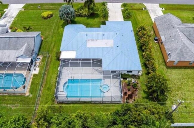 Building Photo - 6461 NW Friendly Cir