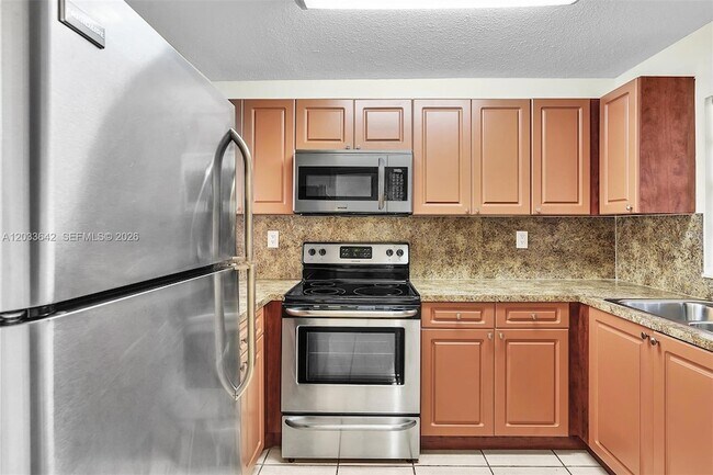Building Photo - 9410 Tangerine Pl