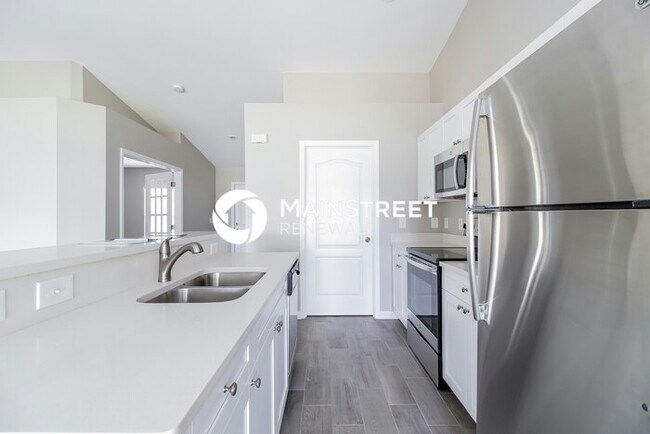 Building Photo - 3 Bedroom Pet-Friendly Home in Cape Coral, FL with Main Street Renewal