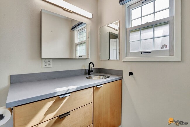 Building Photo - Spacious and bright condo located in a quiet area that boasts the perfect combination of style an...