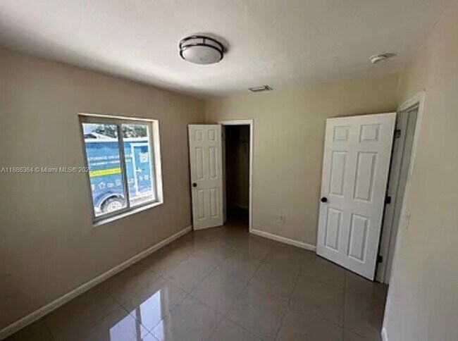 Building Photo - 8931 NW 16th Ave