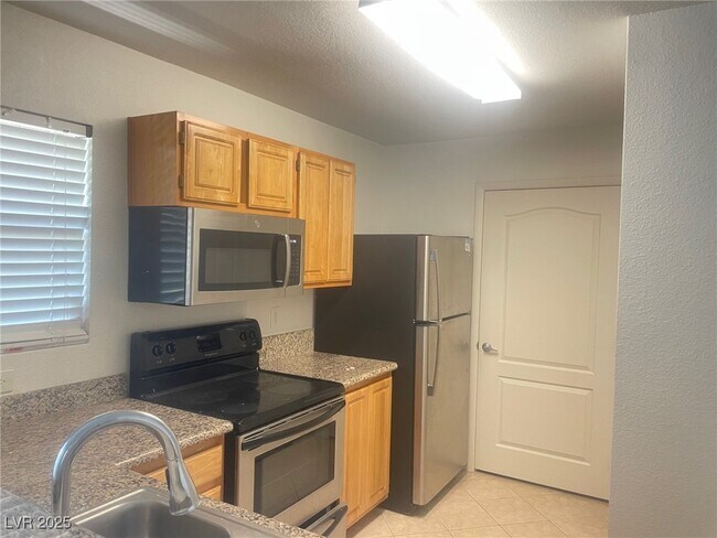 Building Photo - 5055 W Hacienda Ave