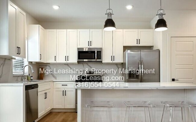 Building Photo - Move in by April 1 and receive $750 off your first month’s rent with a 15-month lease!