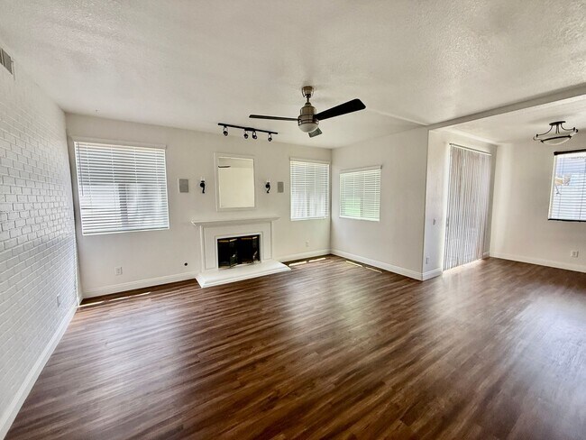 Building Photo - Spacious 4 Bedroom, 3 Bath Home with 3-Car Garage & Landscaping Included