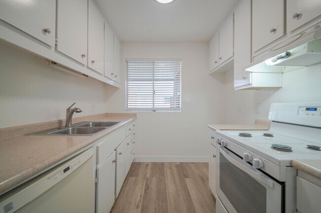 Building Photo - Welcome to Your Updated Home in the Heart of South Coast Metro!